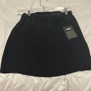 Black Valentina skirt, Reformation. Never worn, great basic, new with tags